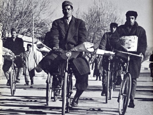 Newspaper delivery boys distributing the morning daily Islah, one of Kabul’s daily newspapers