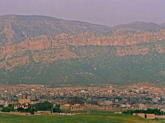 Ilam, the small provincial capital, backs onto the sheer heights of the Zagros Mountains, with forested slopes surrounding it.